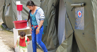 Беженцы с Украины, размещенные в палаточном городке в Ростовской области. Июнь 2014 г. Фото: ГУ МЧС России по Ростовской области