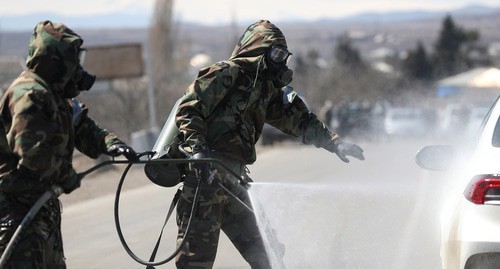 Дезинфекция в Марнеули. Грузия, 25 марта 2020 года. Фото: REUTERS/Ираклий Геденидзе